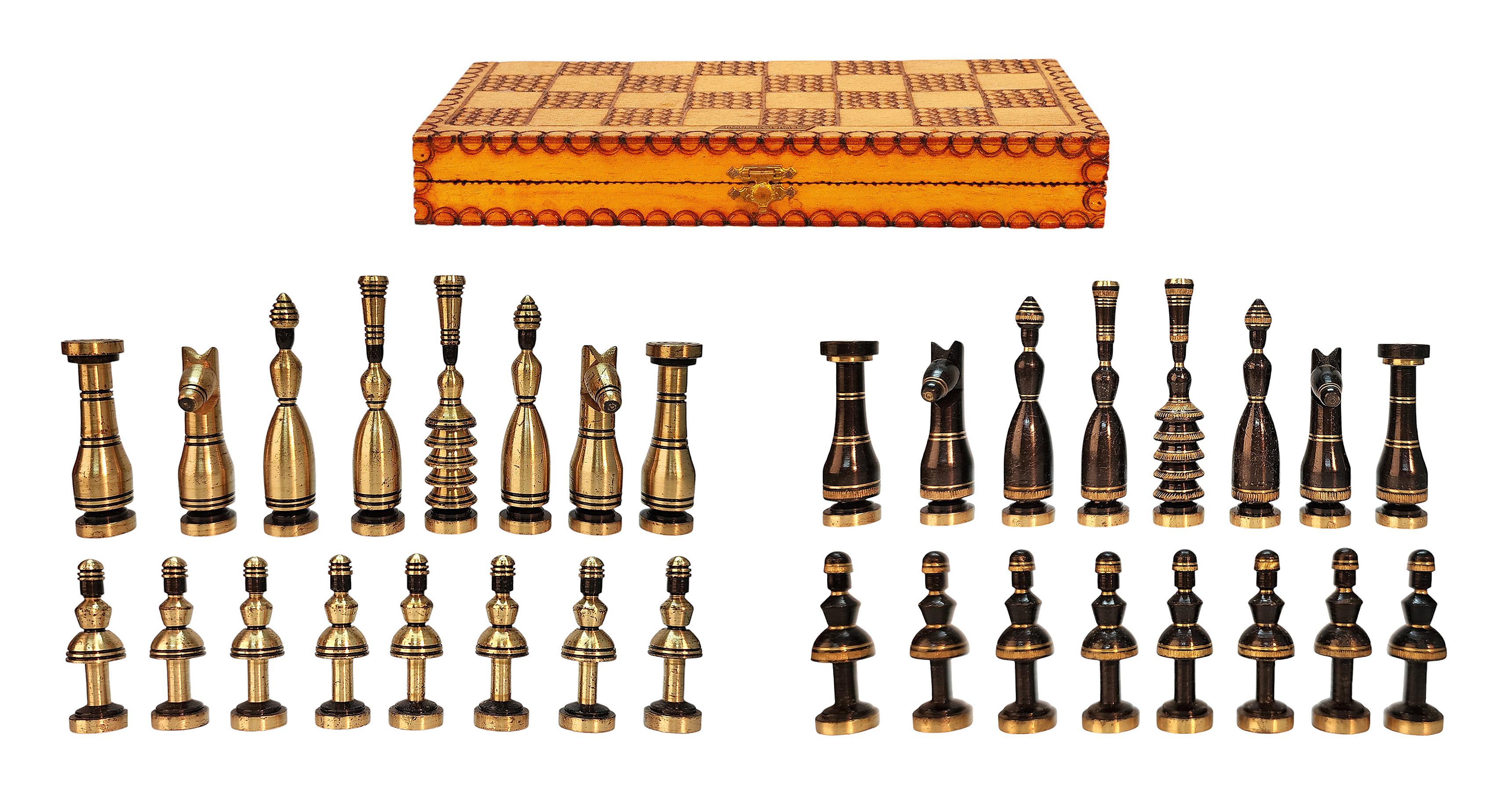 Mid-20th century golden and black brass chess set with wooden board/box by Hans Teppich, Israel

By: Hans Teppich
Material: metal, copper, wood, zinc, brass
Technique: cast, molded, polished, metalwork, carved, hand-carved, hand-crafted
Dimensions:
