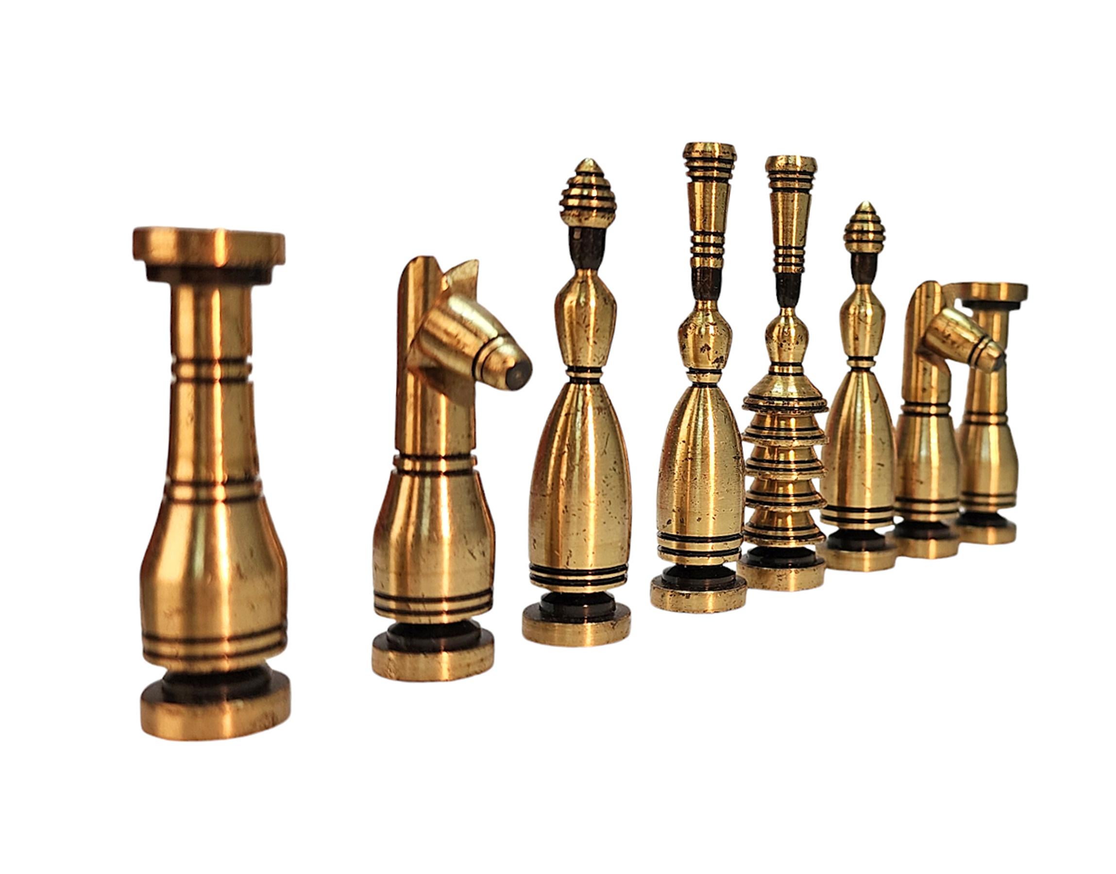 Carved Mid-20th Century Brass Chess Set with Wodden Board/Box by Hans Teppich, Israel For Sale