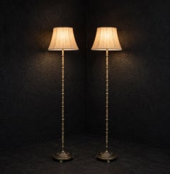 Mid-20th Century brass floor lamps with lion paws