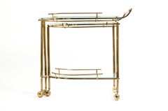 Mid-20th Century Brass / Glass Three-Tier Swivel Wheeled Bar Cart