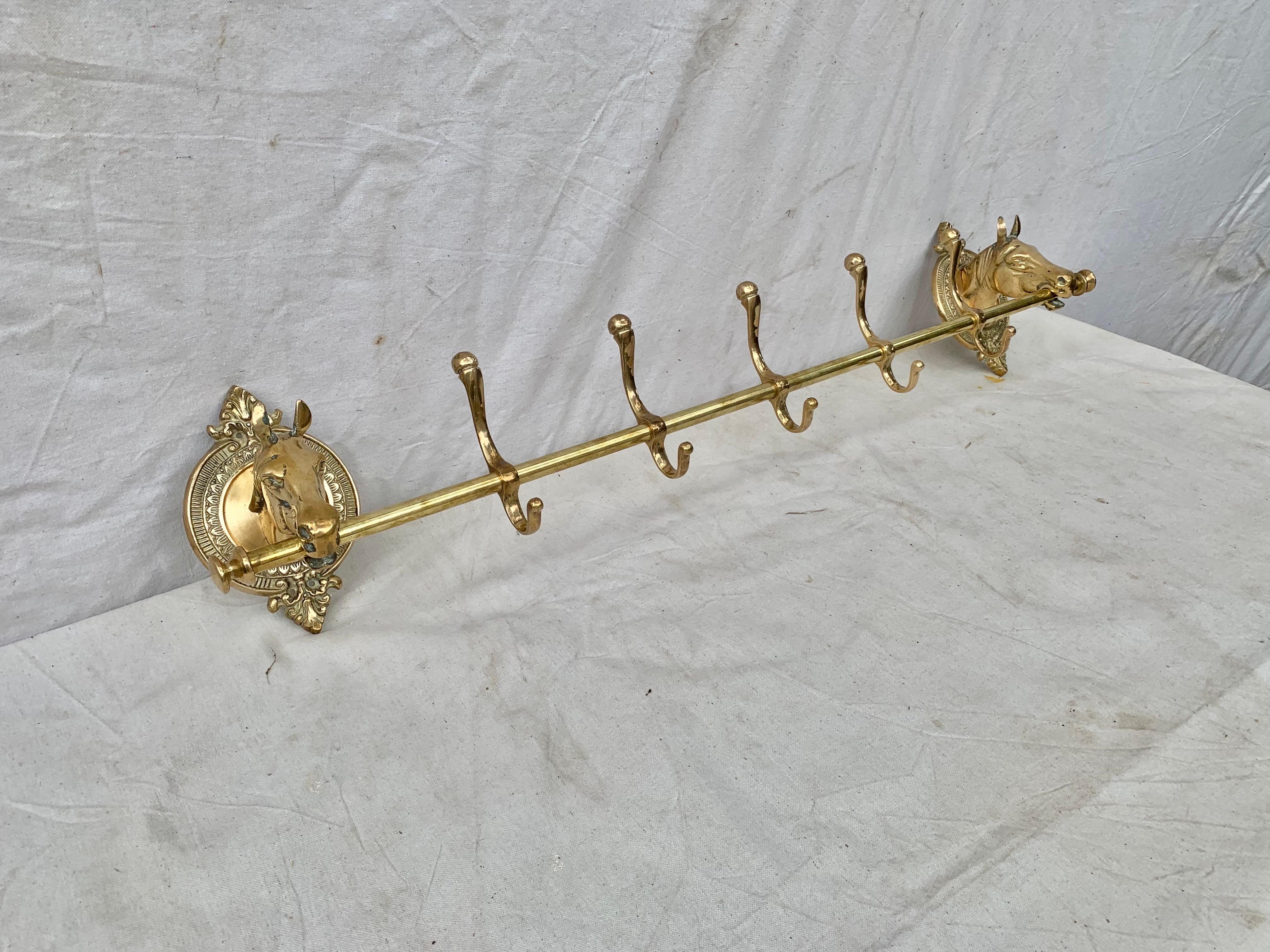 brass horse head coat rack