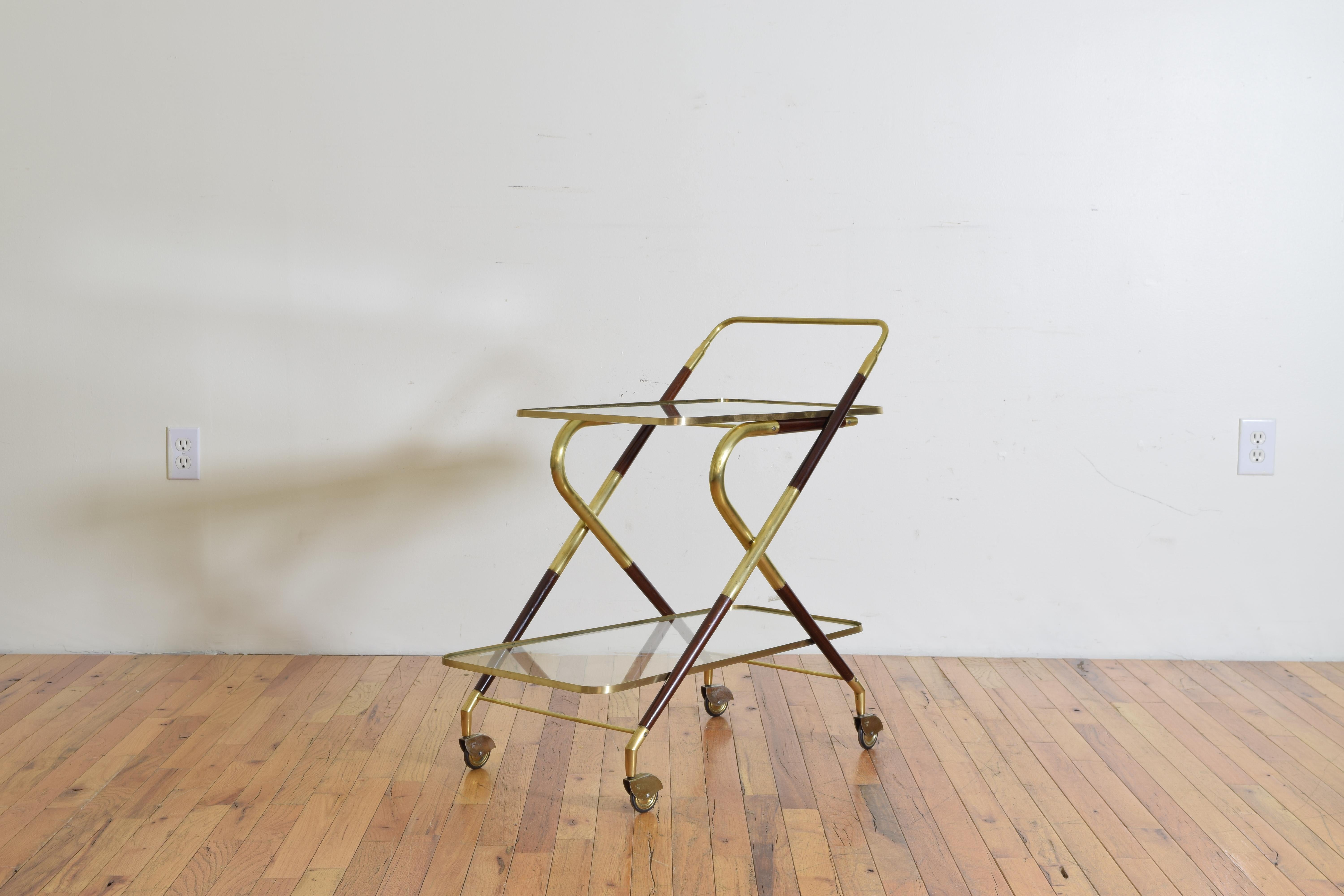 An Italian trolley or bar cart in brass and rosewood in the style of Cesare Lacca, circa 1950s.