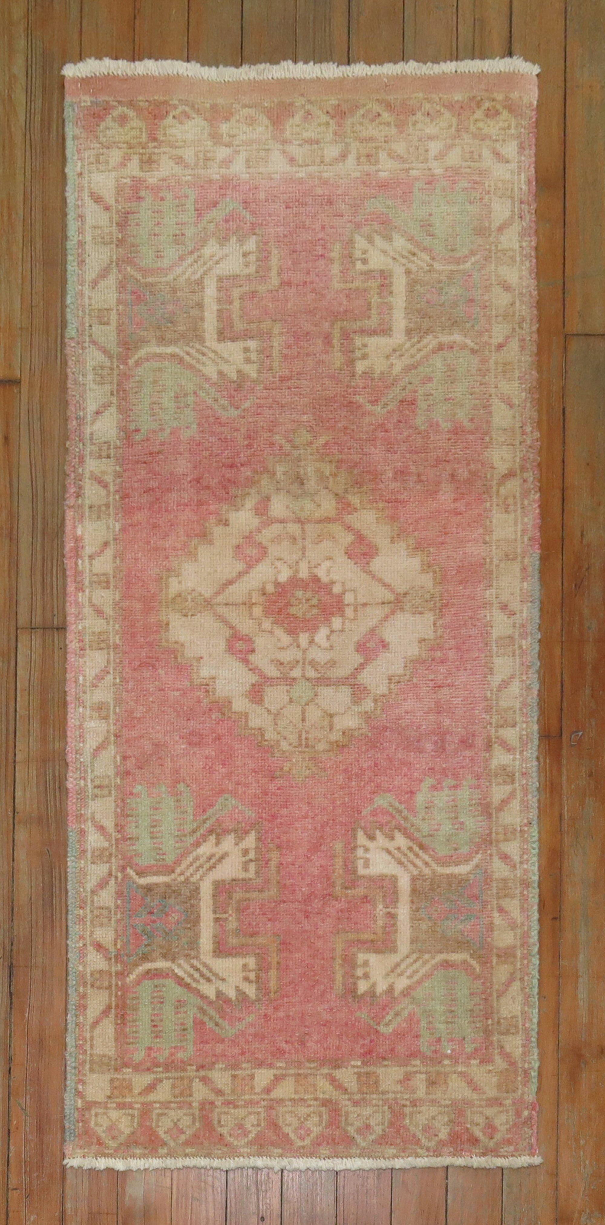 One of a kind vintage Turkish rug in a rare bubble gum pink color.

Measures: 1'8