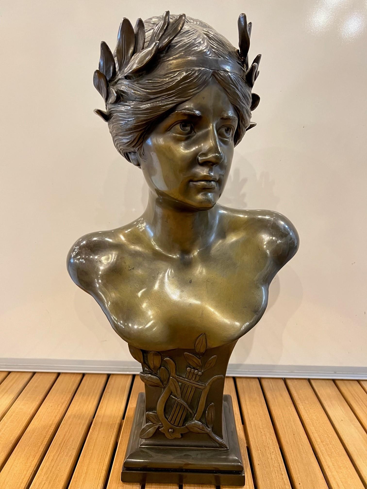 The Mousai (Muses) were the goddesses of music, song and dance, the source of inspirations to poets. They were also goddesses of knowledge who remembered all things that had come to pass. This is a beautiful polished bronze bust with her hair tied