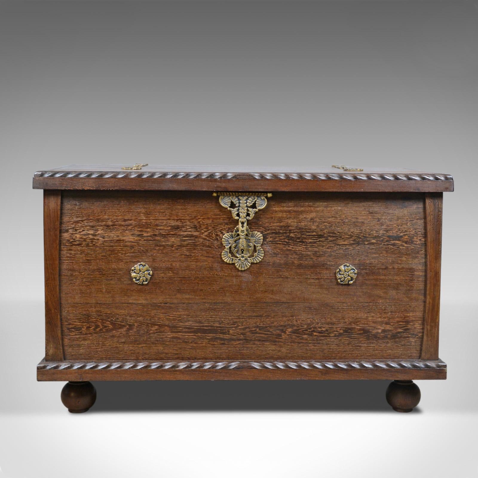 This is a mid-20th century Burmese chest. A hard wood teak trunk contemporary to the Art Deco period, circa 1940.

Of quality timber and craftsmanship
Attractive grain detail in a wax polished finish
Deep, rich tones and a desirable aged