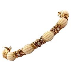 Vintage Mid-20th Century Carved Angel Skin Coral Diamond 18K Yellow Gold Link Bracelet