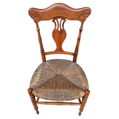Mid-20th Century Carved Mahogany and Low Rush Seat Side Chair