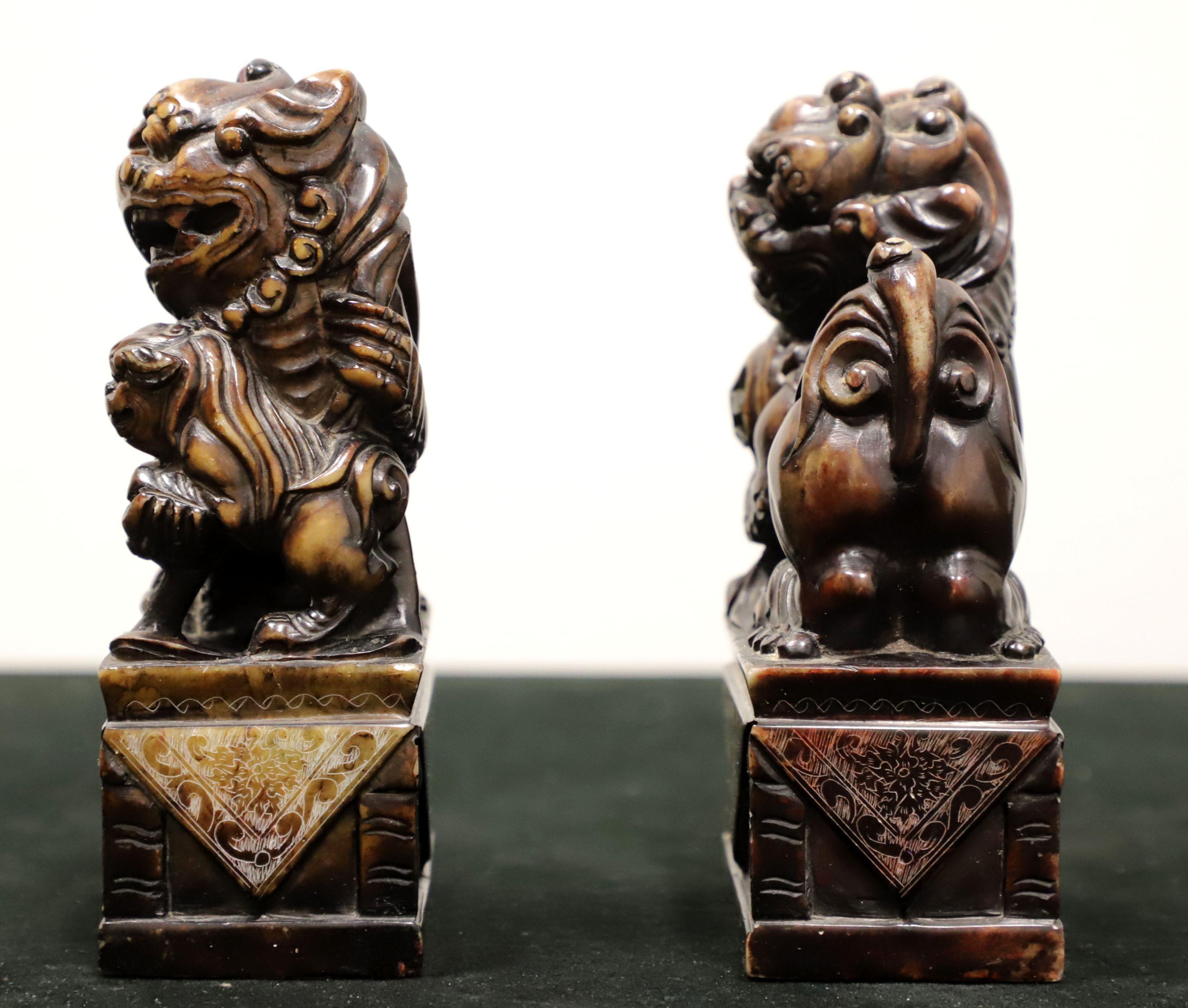Mid 20th Century Carved Soapstone Sculptures Chocolate Colored Foo Dogs - Pair In Good Condition For Sale In Charlotte, NC