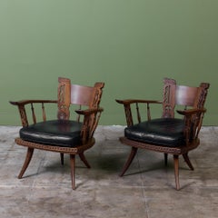 Poltrone in noce intagliato della metà del XX secolo in stile Ettore Zaccari