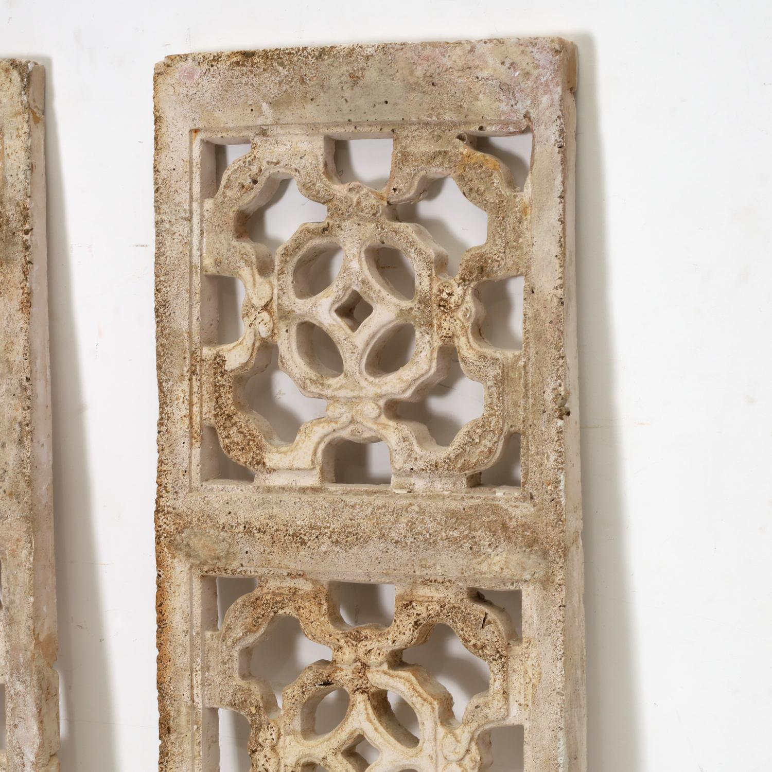 20th C., cast stone panels with attractive patina. The panels could be used outdoors or for interior decoration. The back side of the panels have metal wall mounts.

Dimensions:
66.5