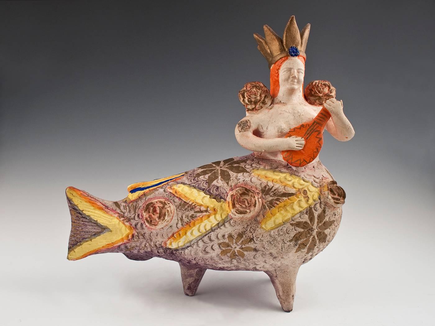 Offered by Zena Kruzick
Mid-20th century ceramic mermaid Folk Art sculpture, Mexico

Earthenware, slip decoration, glaze 
Ex. Fred and Nancy Roscoe collection, California, collected in the 1950s.
    