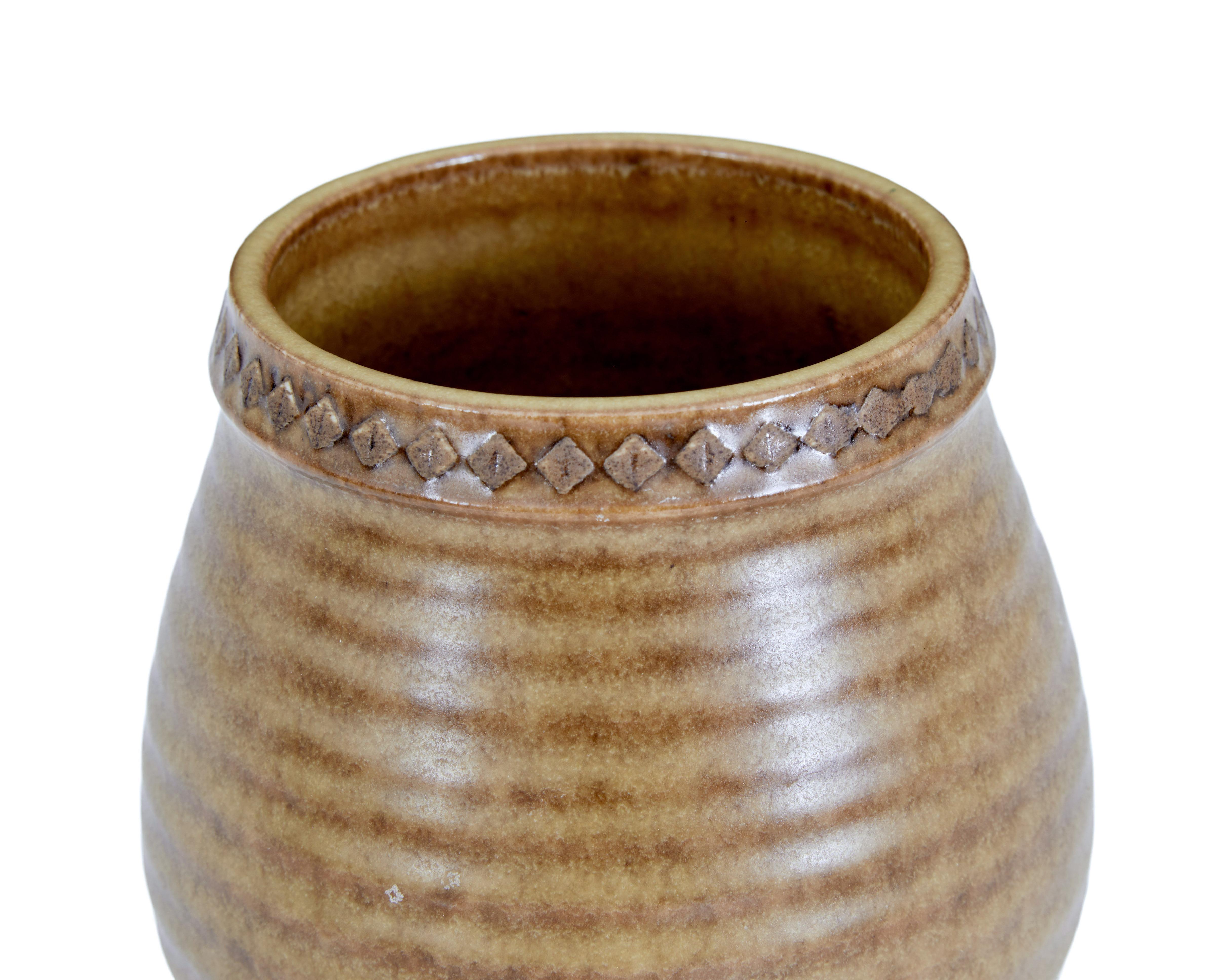 Mid-20th century ceramic pot by Gunnar Nylund of Rorstrand, circa 1950.

Fine quality small pot or even a occasional goblet, designed by Gunnar Nylund. Glazed and in very good condition. Hand signed on the underside.