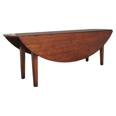 Mid 20th Century cherry drop leaf table