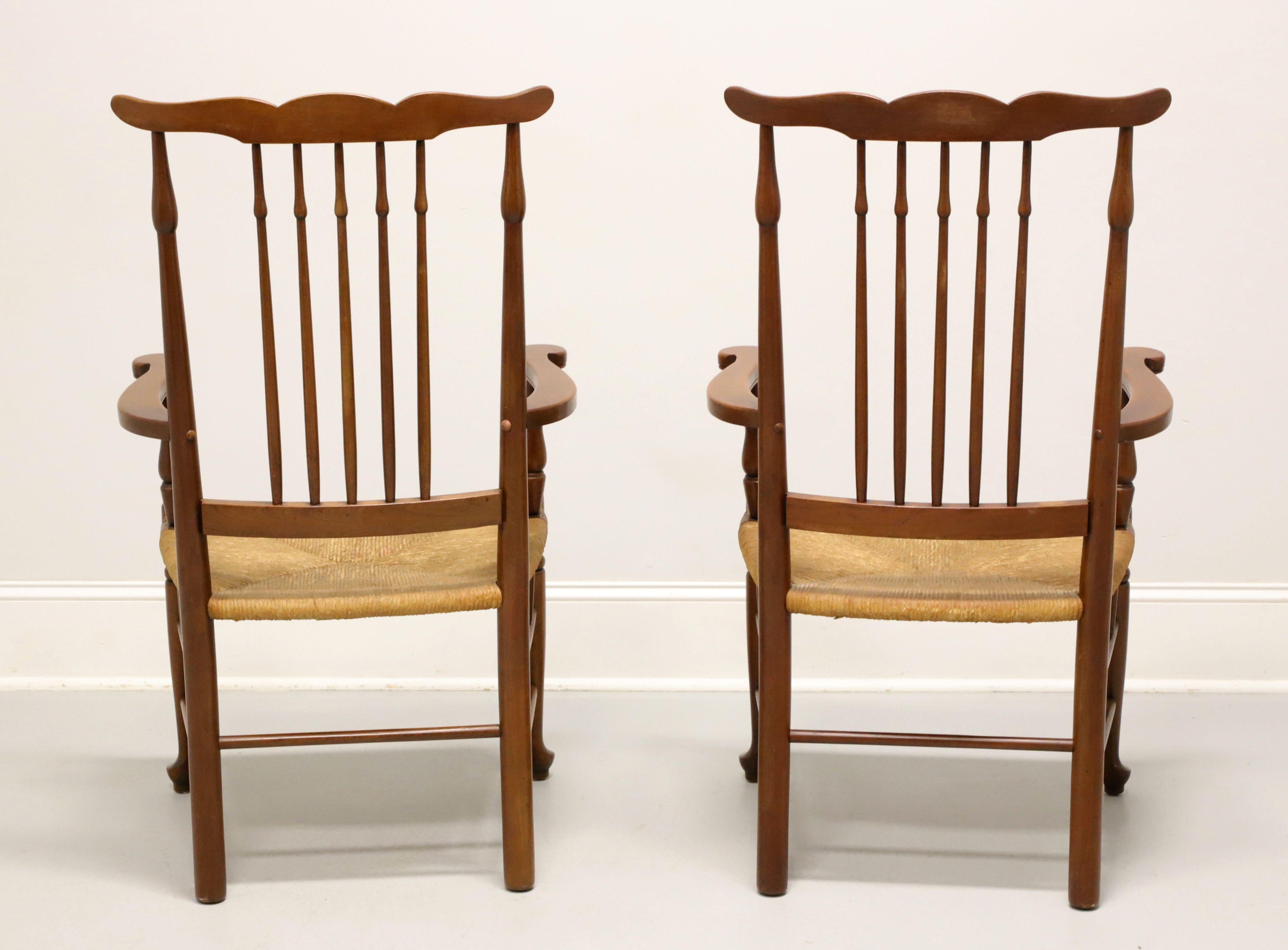 Mid 20th Century Cherry Farmhouse Dining Armchairs with Rush Seats - Pair In Good Condition For Sale In Charlotte, NC