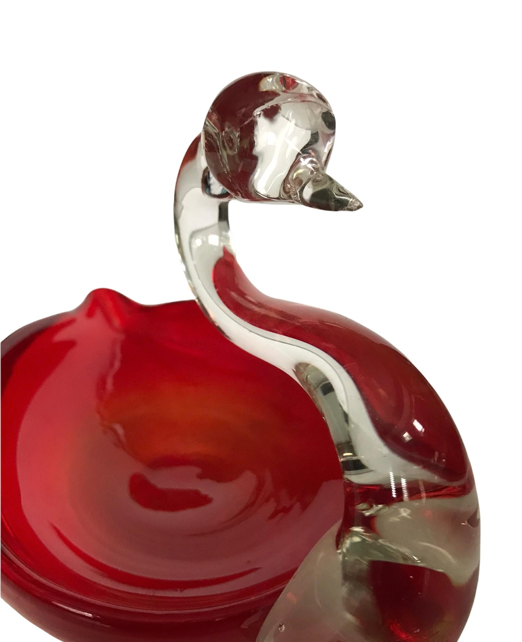 Extraordinary mid 20th century cherry red piece of art glass. Gorgeous delicate swan candy dish, in a two-tone clear glass head/neck and cherry body bowl. In the style of Murano Italy.