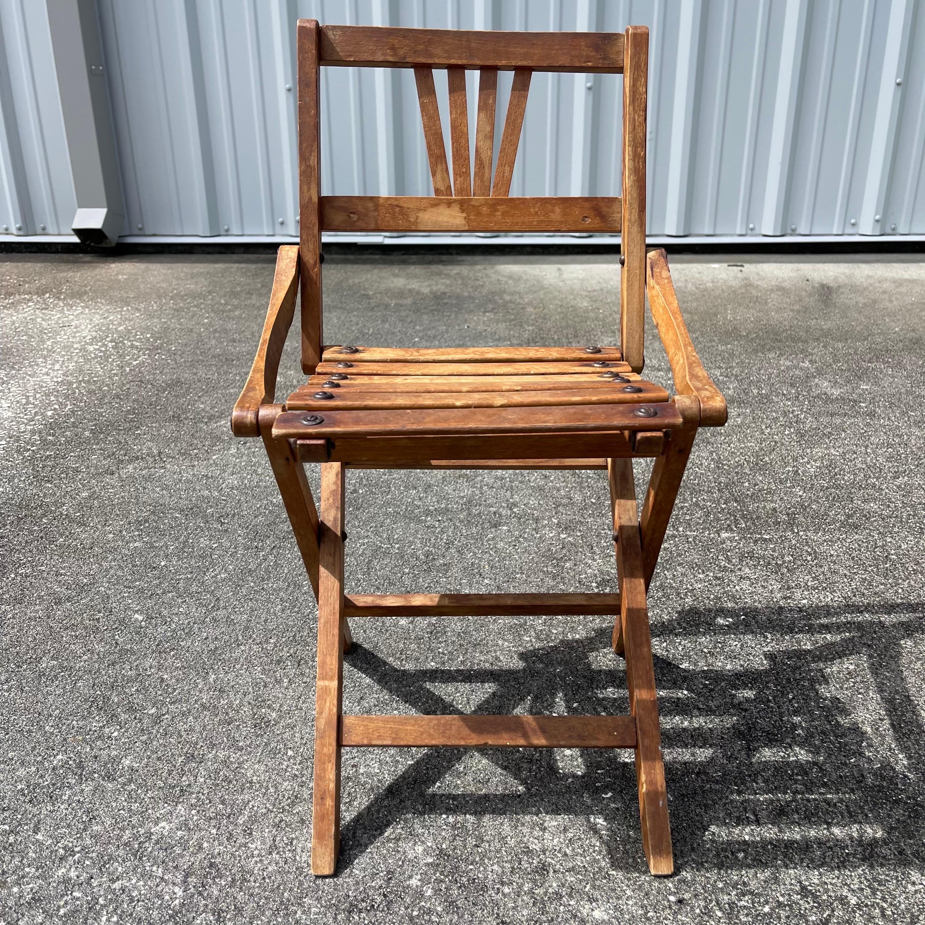 Charming child’s folding chair, mid-20th century. Likely French or Italian.