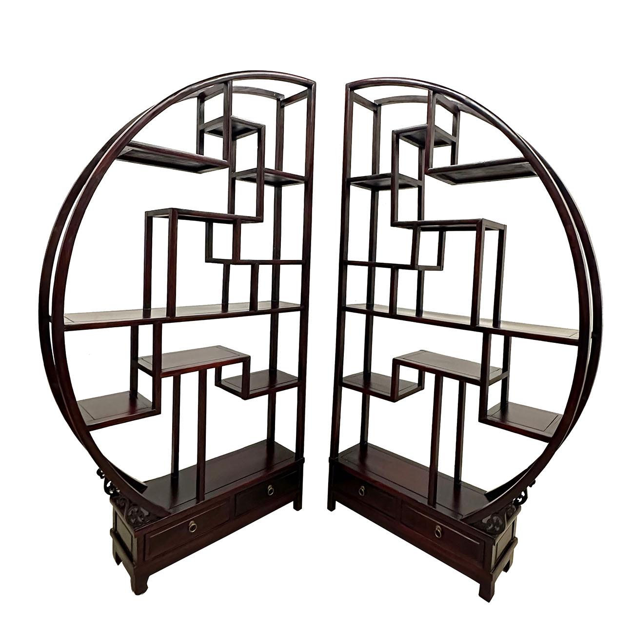 This unique piece is a classical Chinese art deco display/room divider in the original condition, all hand carved and free standing shelving unite in dark mahogany finished.   It features plenty of irregular shapes shelf to display your treasures on