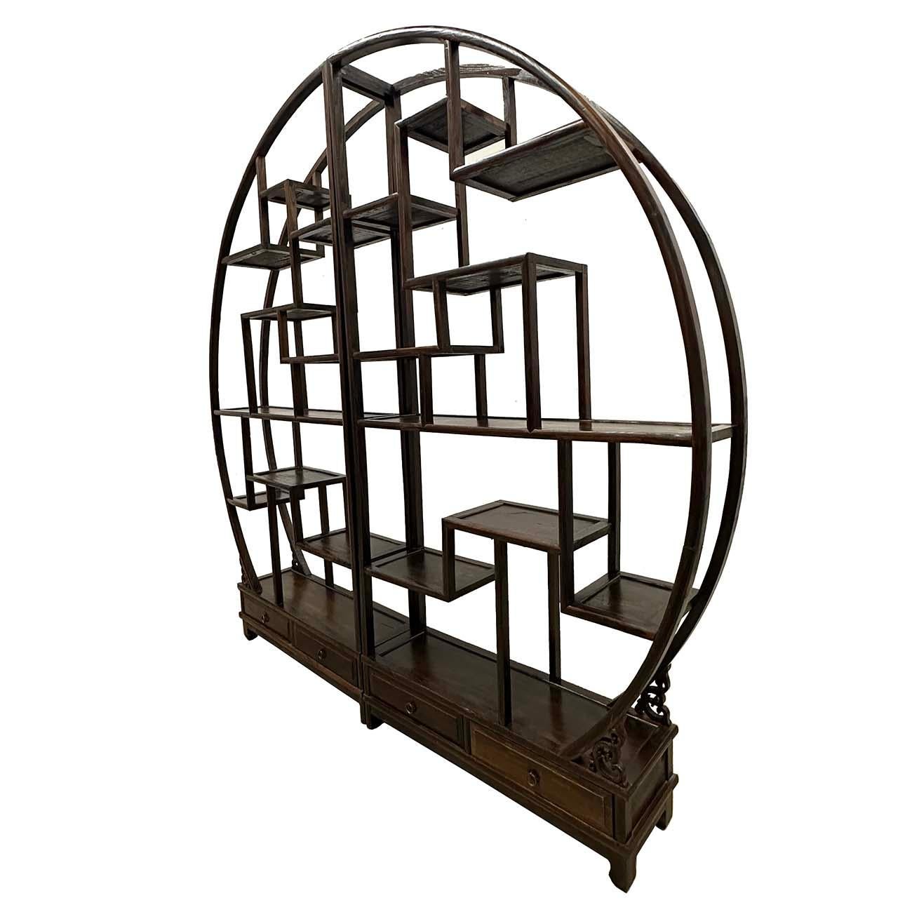 This unique piece is a classical Chinese art decor display/room divider in the original condition, all hand carved and free standing shelving unite in dark mahogany finished. It features plenty of irregular shapes shelf to display your treasures on