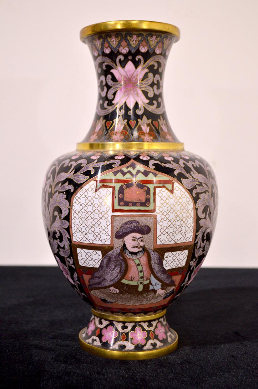A very fine quality Chinese cloisonné bottle vase from the mid-20th century. Cloisonné, in the decorative arts, which consists of soldering to a metal surface delicate metal strips bent to the outline of a design and filling the resulting cellular