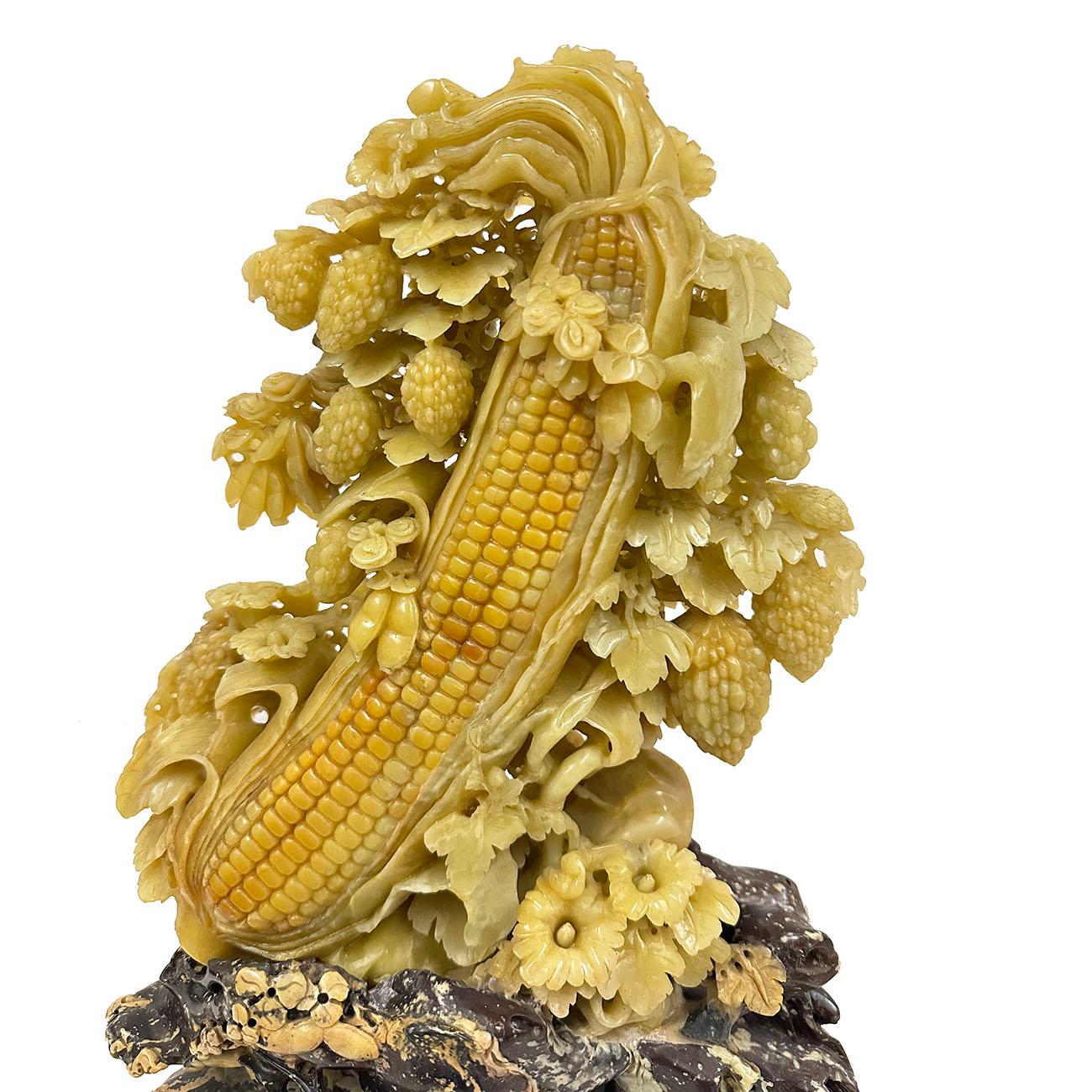 

This magnificent vintage Chinese Jade sculpture is all hand made and hand carved with corn and bitter melon. The corn has beautiful meanings such as a house full of gold and jade, a house full of descendants, prosperous business, and peace every