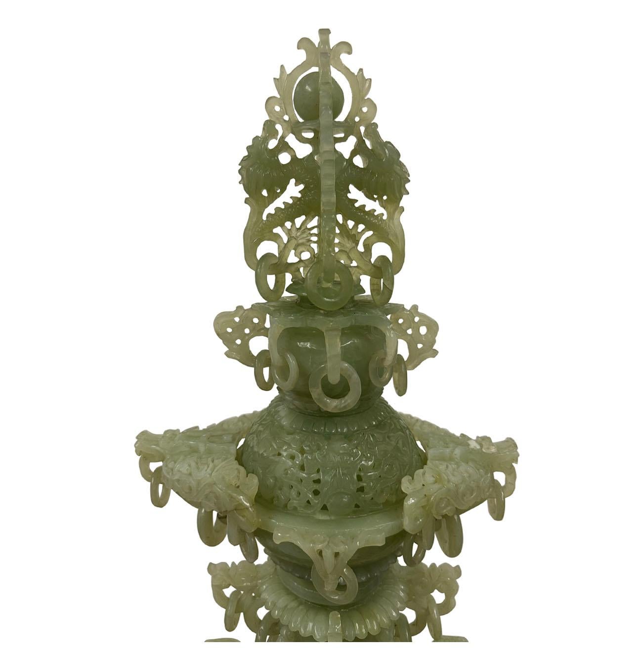 This huge Chinese Serpentine/Jade tower was Intricately and elaborately open carved dragons with a lot of free rings and chains works and details. It come with 3 parts stacked together. and can be turned at lower tier. There are 12 carved dragons on