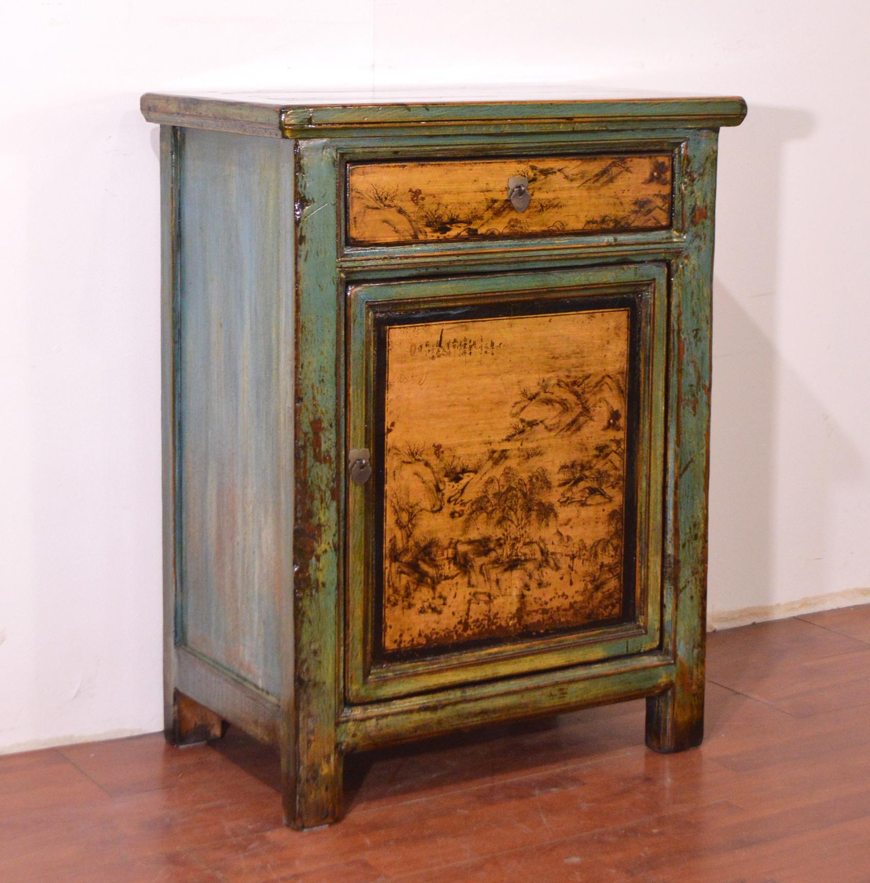 Elegant mid 20th century Chinese buffet elm wooden. In the lacquered green of the sides and the front emerge a quite large door and a drawer in mustard yellow where some figurative drawings stand out. Through them we can almost immerge ourselves