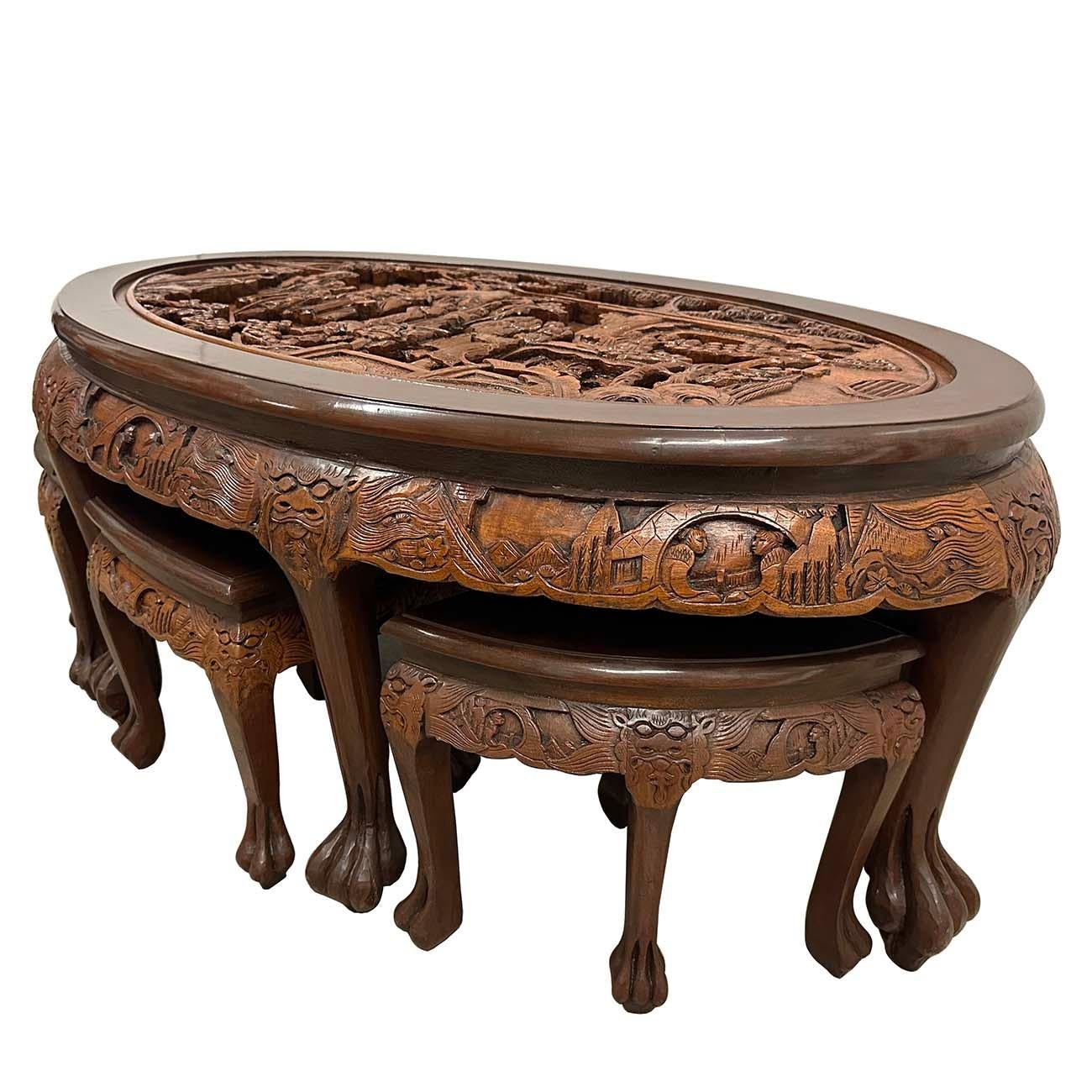 Hand-Carved Mid-20th Century Chinese Massive Oval Carved Coffee Table With 6 Nesting Stools For Sale