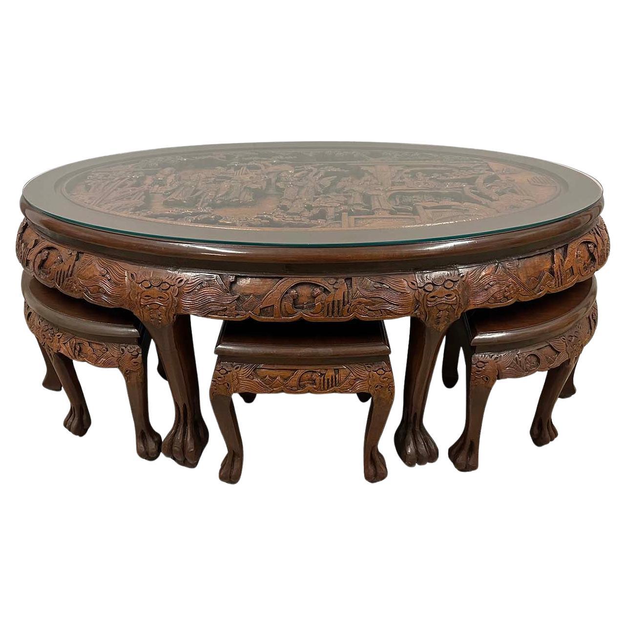 Mid-20th Century Chinese Massive Oval Carved Coffee Table With 6 Nesting Stools