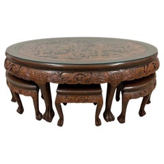 Mid-20th Century Chinese Massive Oval Carved Coffee Table With 6 Nesting Stools
