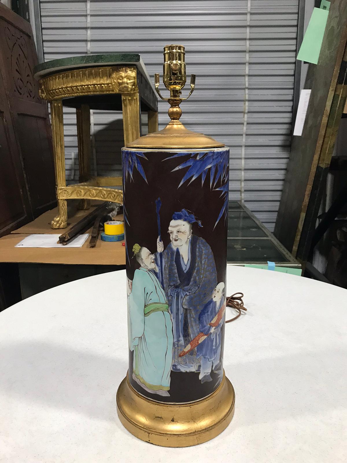 Mid-20th century Chinese pottery lamp with figural scene lamp on custom gilt base
New wiring.