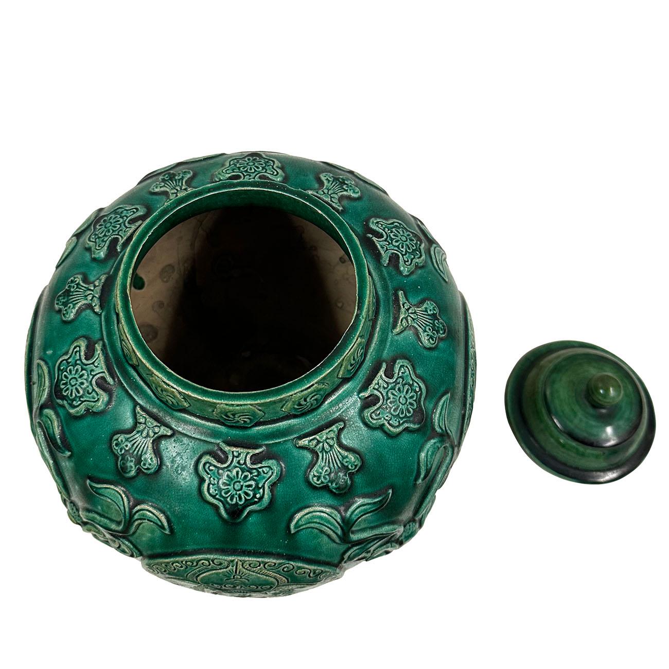 Hand-Carved Mid-20th Century Chinese Raised Carved Glazed Ceramic Jar with lid. For Sale