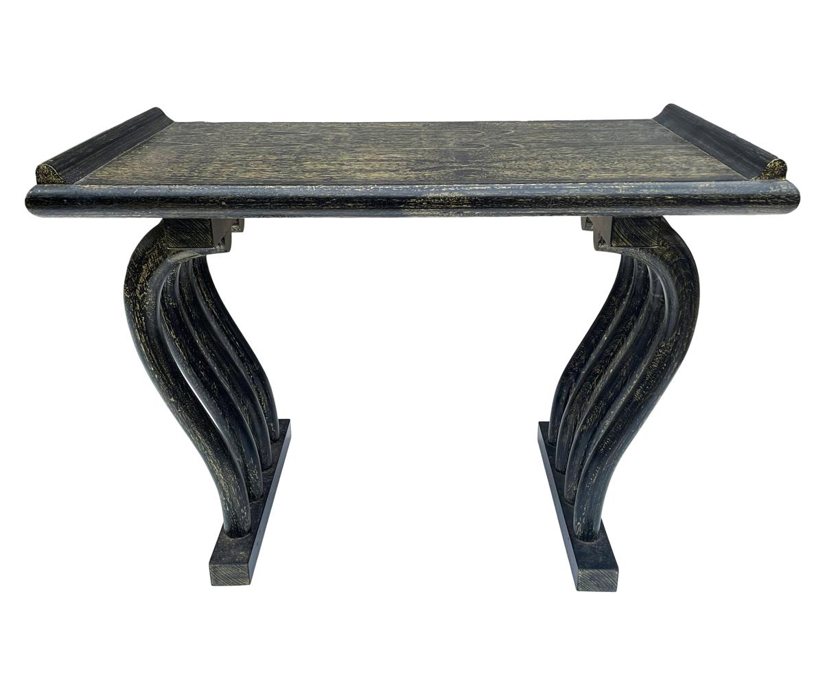 This sleek Chinese transitional table is circa 1950's. It features solid wood construction with an unusual two tone finish.