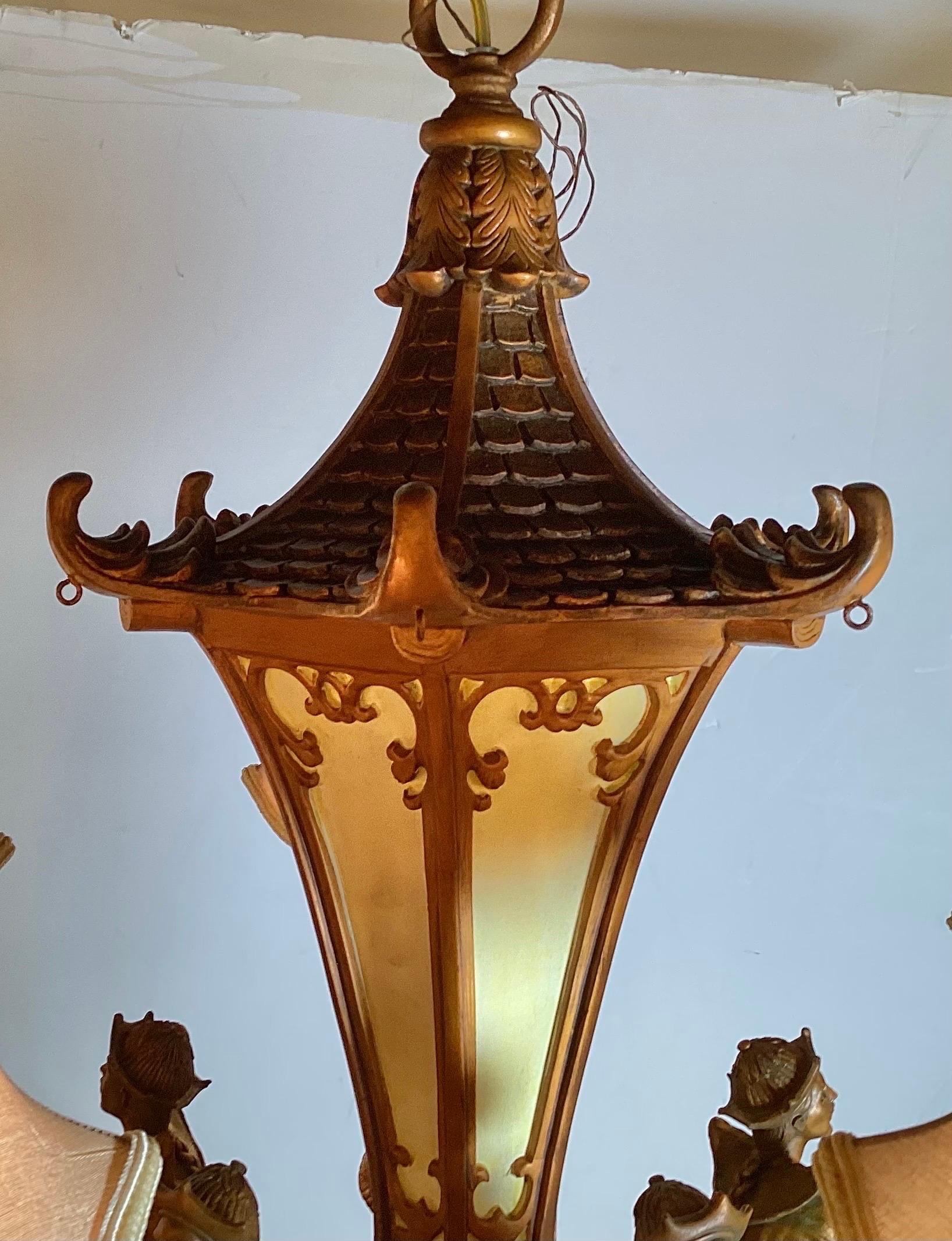 Mid-20th Century Chinoiserie Chandelier W/ Figures Riding Camels & Pagoda Shades In Good Condition For Sale In Lambertville, NJ