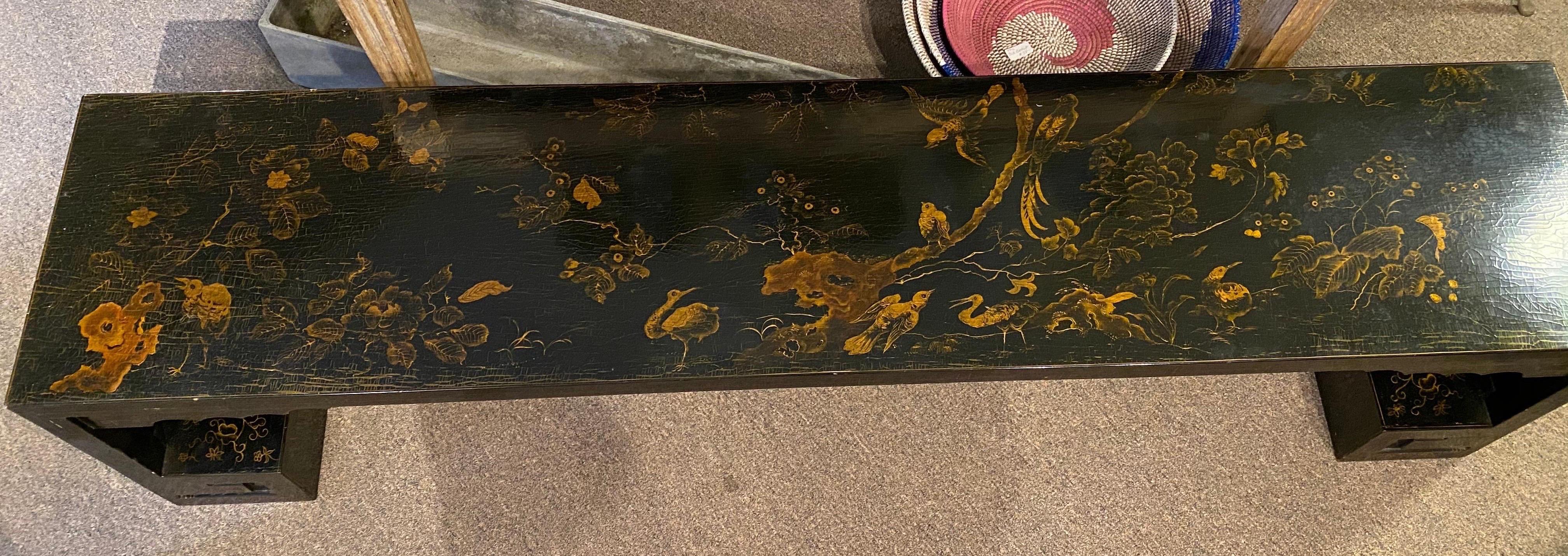 Great quality midcentury chinoiserie coffee table or bench. Hand decorated with gilt and lacquered, the piece is made up of 