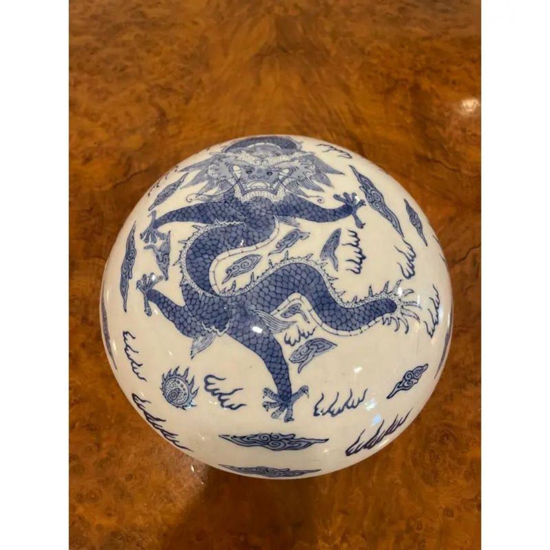 Add a touch of mystique to your collection with this exquisite Large Covered Hand-Painted Dragon and Flaming Pearl Bowl. Crafted with meticulous attention to detail, this stunning piece features captivating dragon motifs. Weighing 5 lbs, it exudes