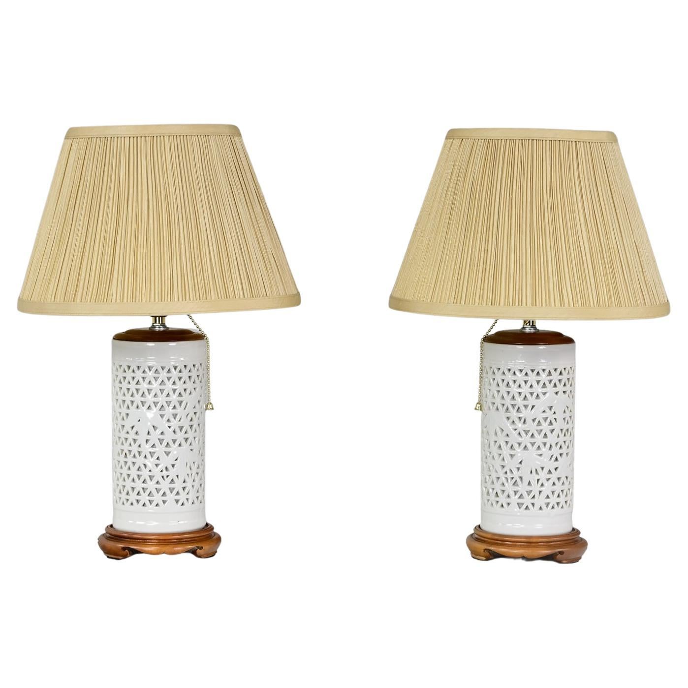 Mid-20th Century Chinoiserie White Pierced Porcelain Blanc De Chine Pair of Lamp For Sale