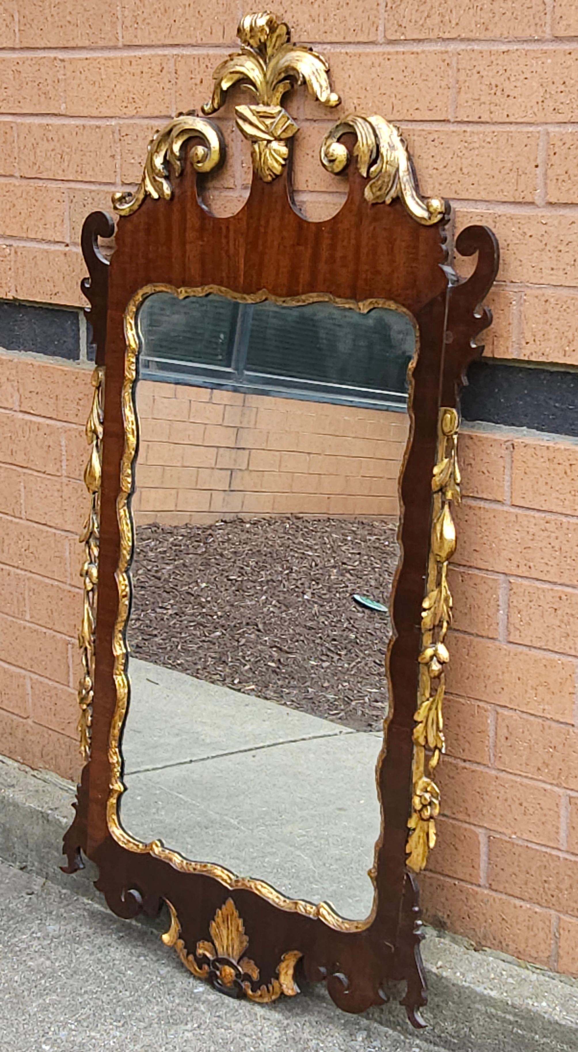 Mid 20th Century Chippendale Style Mahogany Parcel Gilt Wall Mirror  In Good Condition For Sale In Germantown, MD