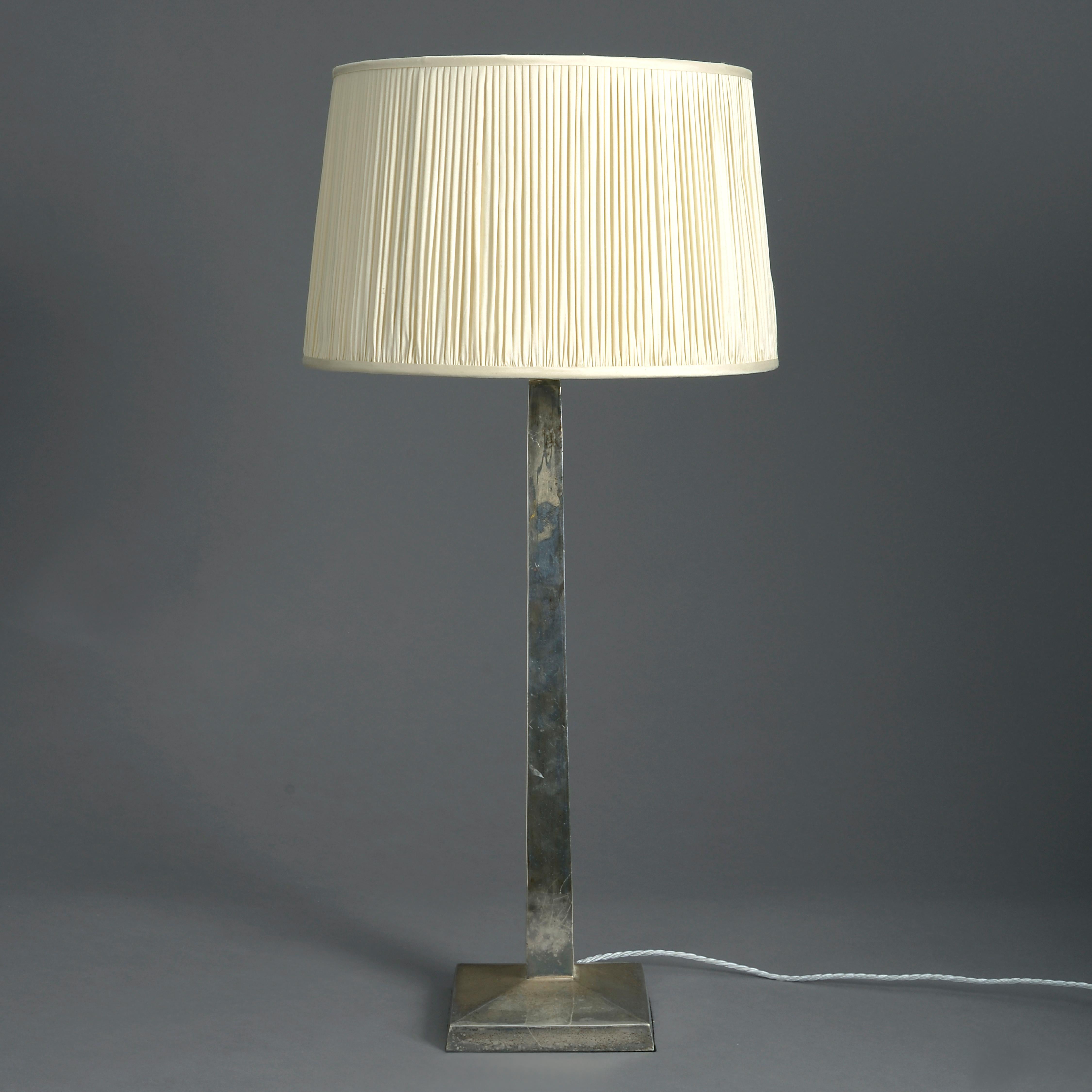 A midcentury chrome column lamp, the square tapering shaft set upon a square plinth base.

Height refers to chrome elements only.

Shades available to purchase separately.

  