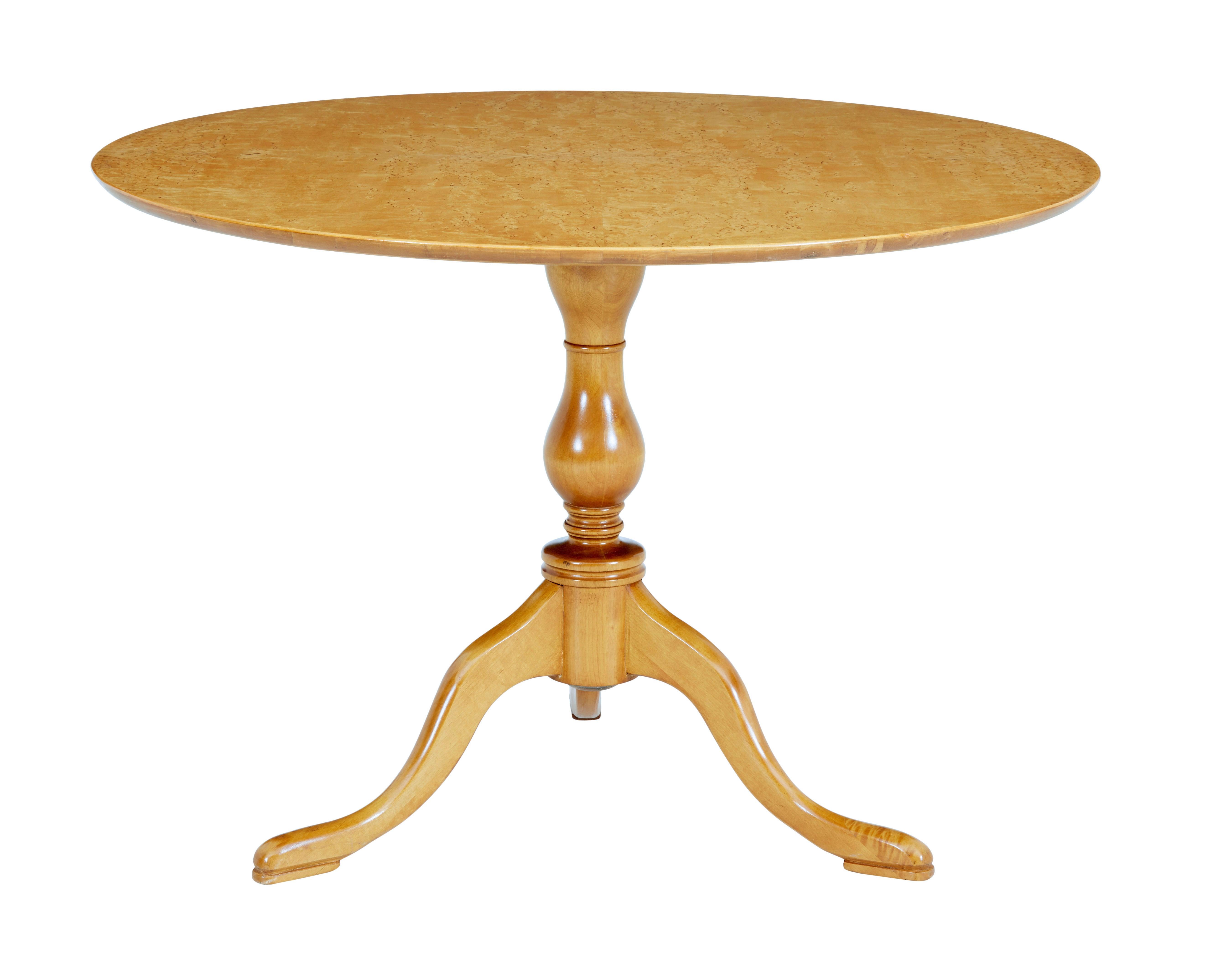 Mid-20th century circular birch occasional table circa 1940.

Fine quality burr birch circular occasional table in the the victorian style. Quarter veneered top surface with burr grain detailing. Turned stem base, standing on 3 legs and pad