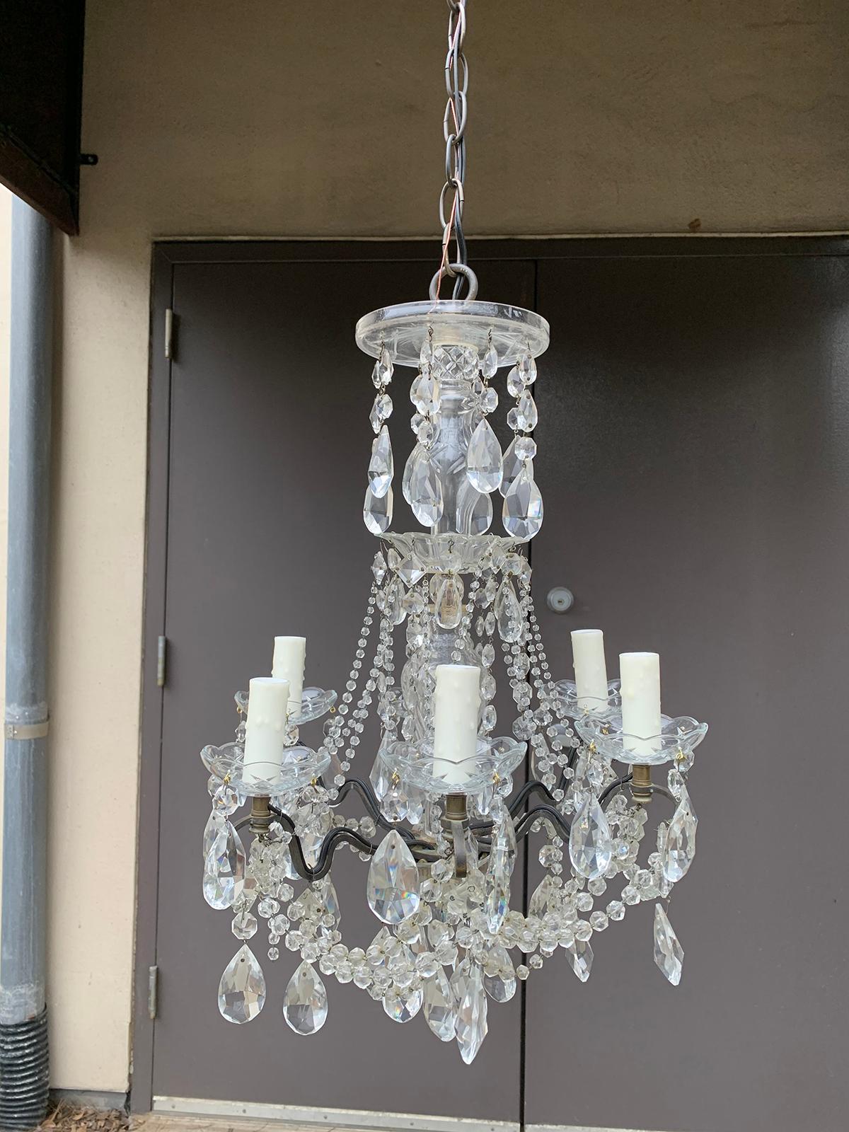 Mid-20th century crystal and bronze six-arm chandelier with prisms
New wiring.