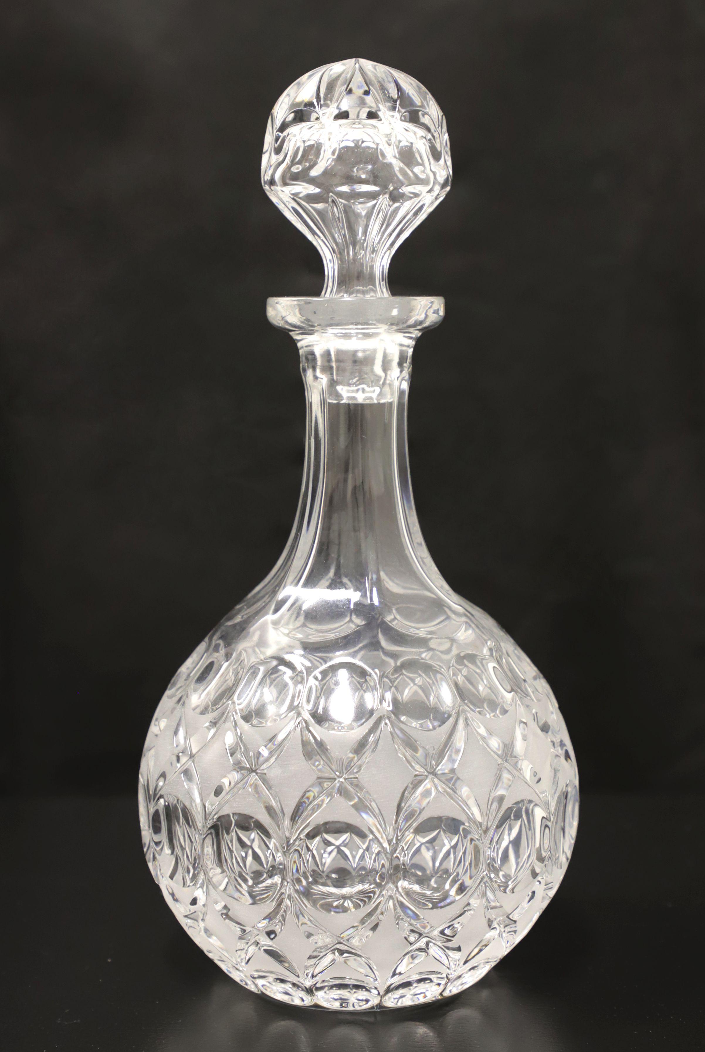 A Mid 20th Century crystal decanter. Clear crystal decanter with bulb shape and bubble & 