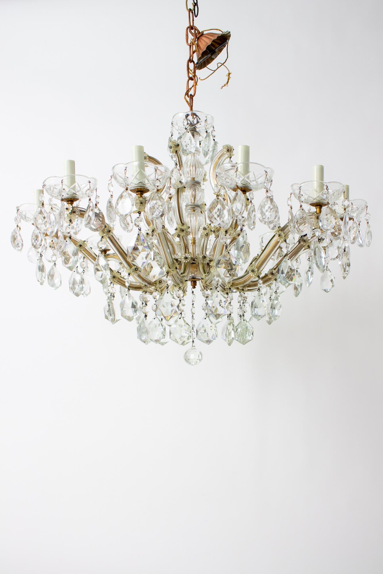 Mid 20th Century Maria Theresa chandelier. According to lore, the Maria Theresa Chandelier was designed for the Czech coronation of Empress Maria Theresa in 1743. She was so enthralled that she had more made for her Viennese palace and the