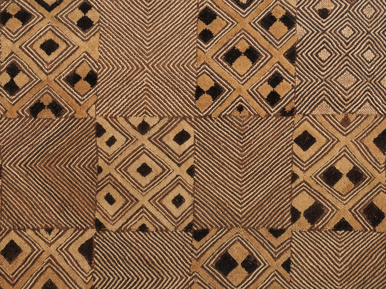 Cut-Pile Raffia Panel, Shoowa People, a northern group of the Kuba, D.R. Congo

A fascinating example of a cut-pile prestige cloth from the Shoowa people, this one as a riff on the checkerboard pattern, with each square containing a variant of the