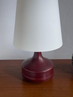 Mid 20th century danish ceramic table lamp with rich oxblood glaze.