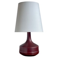 Mid 20th century danish ceramic table lamp with rich oxblood glaze.
