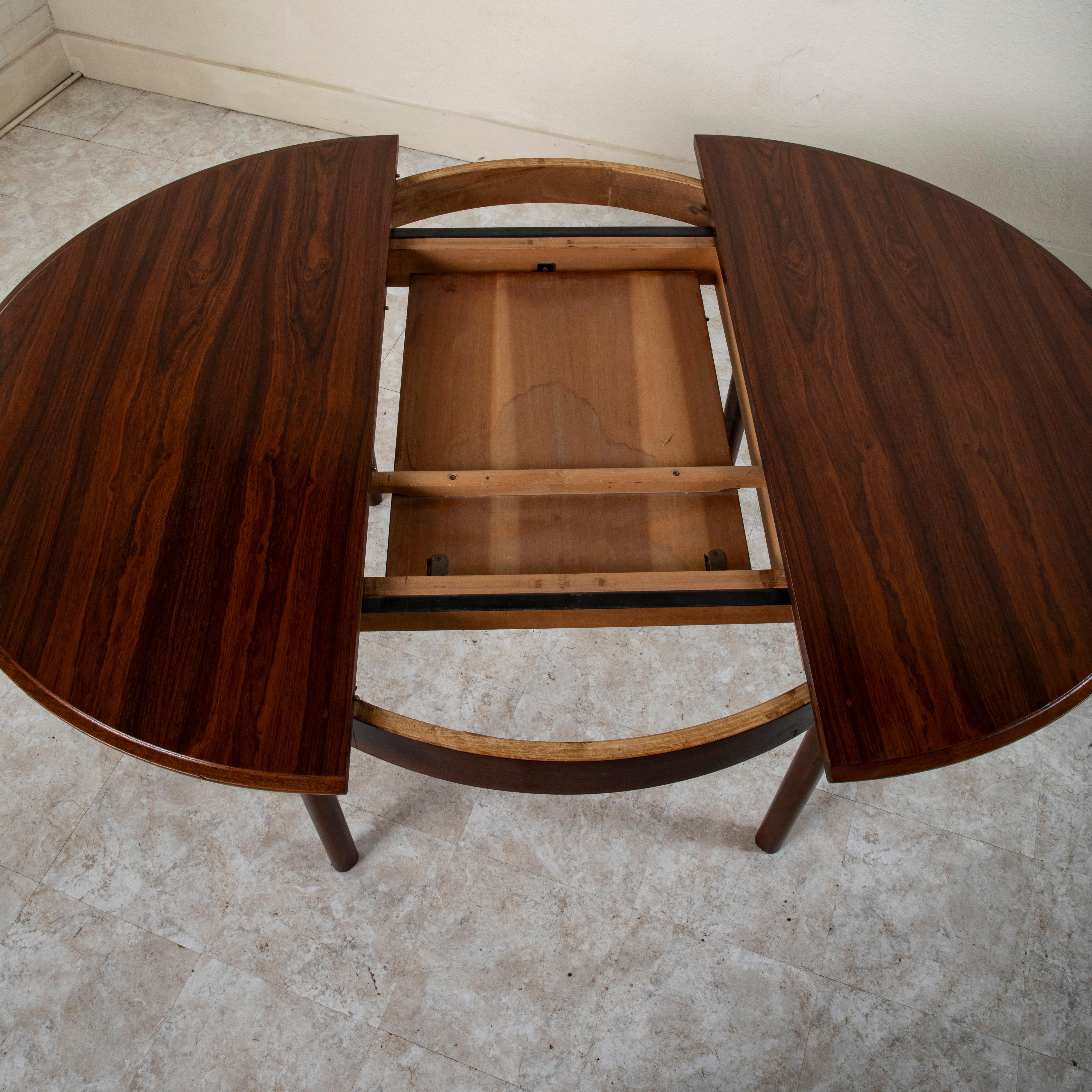 Mid-20th Century Danish Rosewood Round to Oval Dining Table, Collapsible Leaf For Sale 5