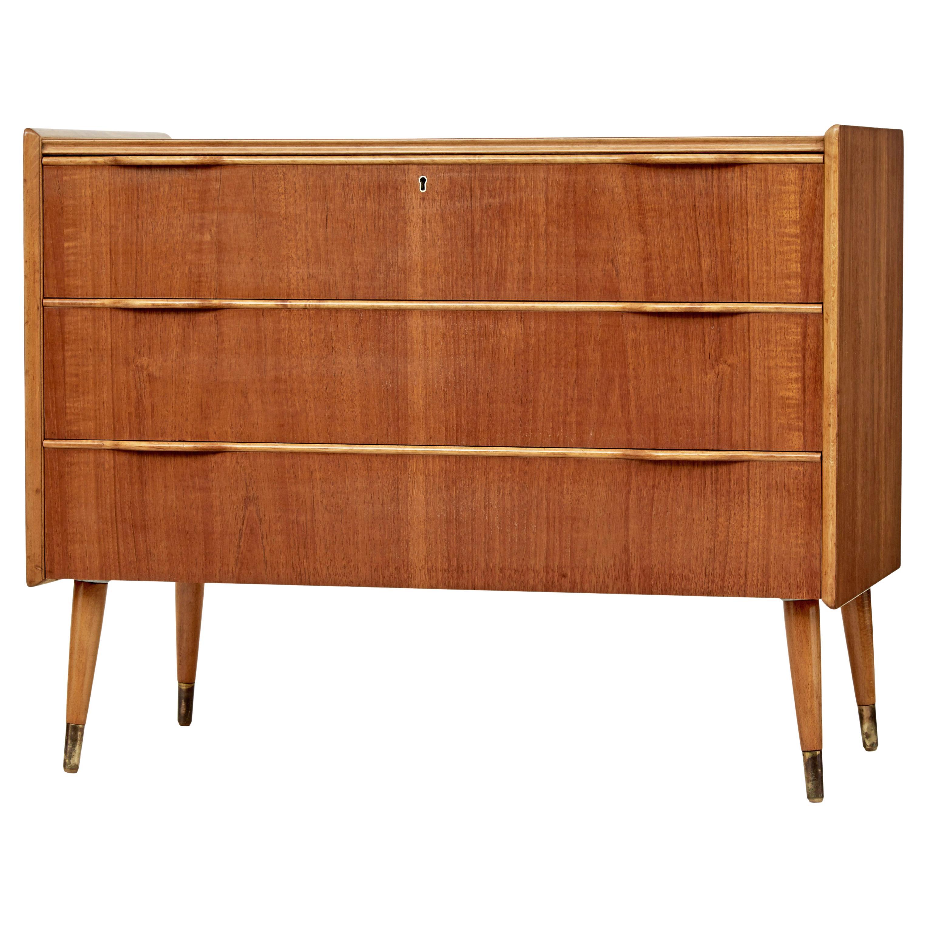 Mid 20th century Danish teak chest of drawers by Henning Jorgensen For Sale