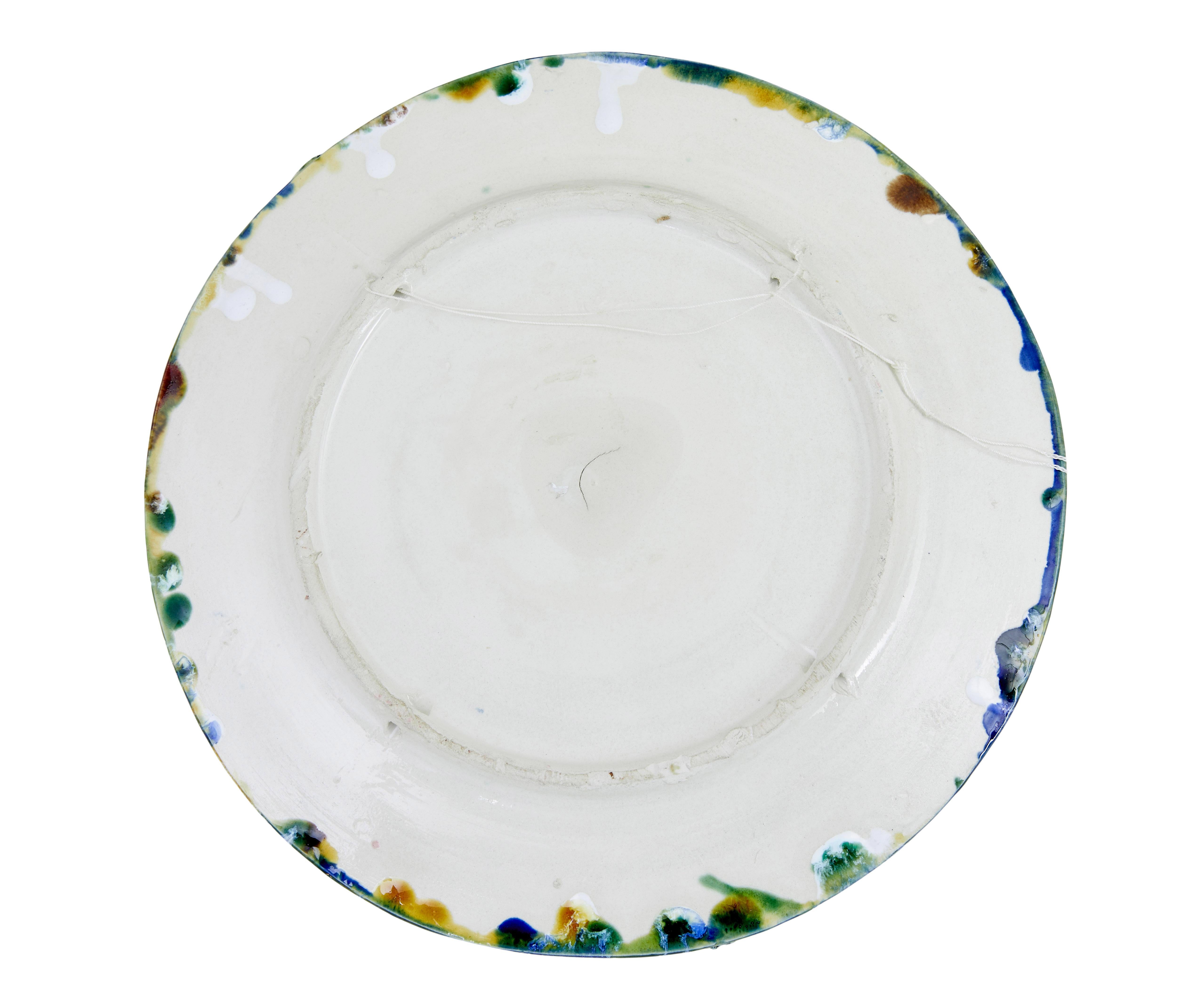 20th century decorative palissy lobster plate circa 1940.

1940's decorative plate depicting a lobster on the sea bed. Fantastic colour and detail. In excellent condition, with fitment holes on the reverse for wall mounting.

Superb decorative item,