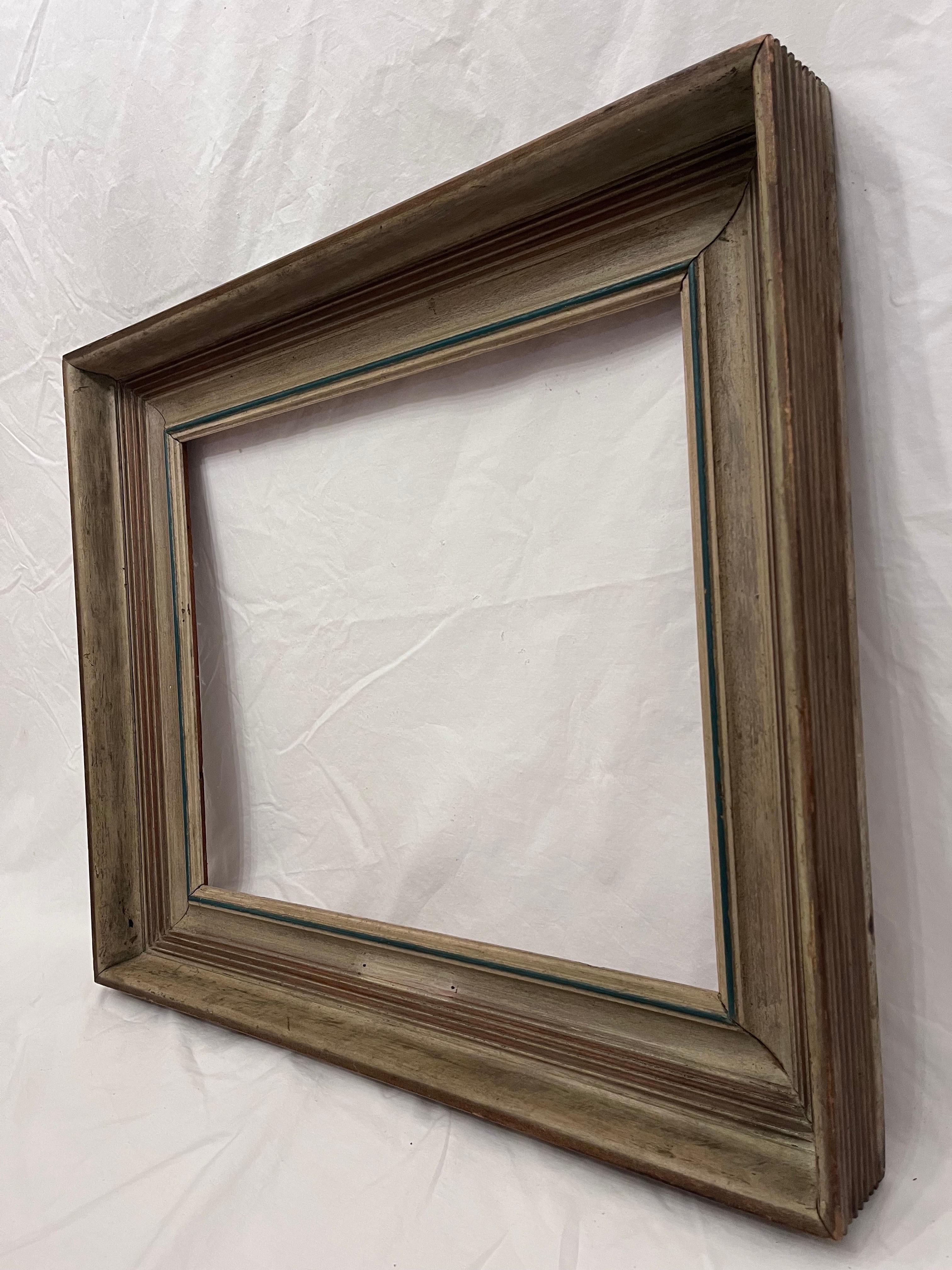 A striking deep profile mid 20th century circa 1950's American Modernist style picture frame. The rabbet size (size that holds the art) is 20.25