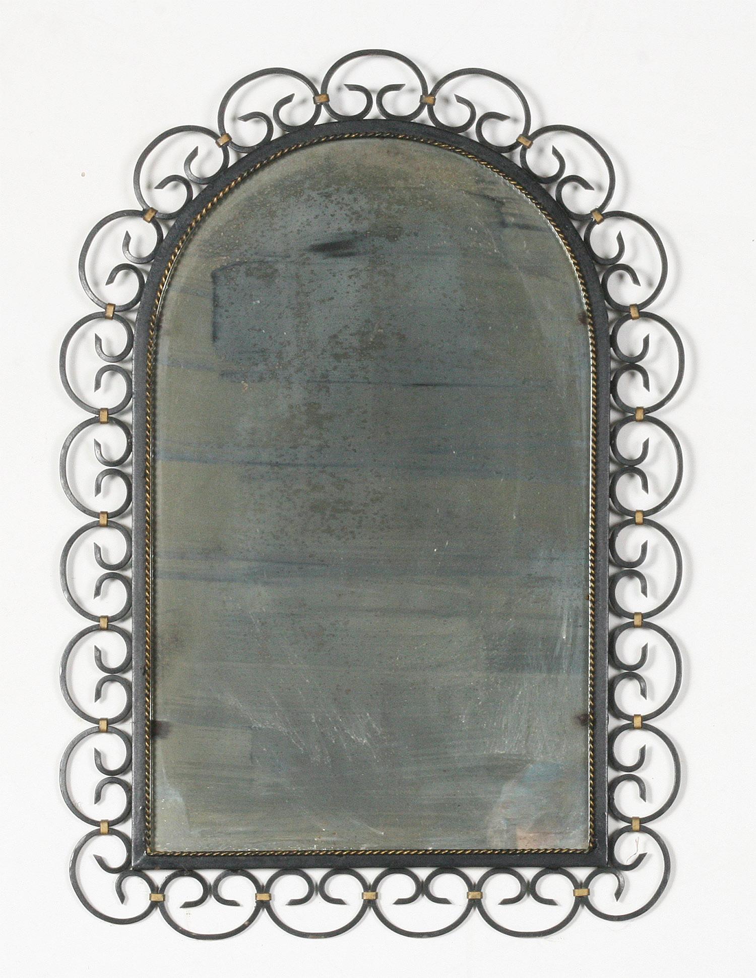 Beautiful mid-20th century design mirror, the frame is made of wrought iron.
Some aging stains on the glass mirror. Furthermore, in good condition.
Made in France circa 1930.
